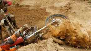 Motorcross rider paralyzed in crash uses powered Ironman exoskeleton to walk again.