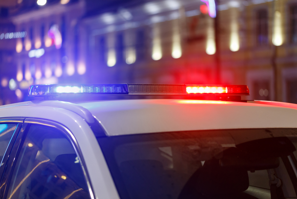 Police lights on in the city at night