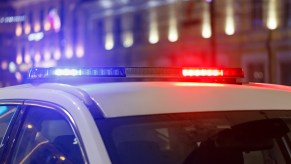 Police lights on in the city at night