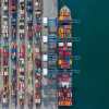 Aerial view of cargo ship loaded with shipping container on Detroit River