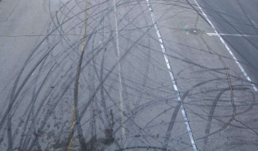 Skid marks on a highway after a street takeover.
