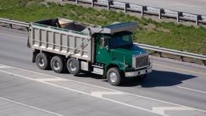 Stolen dump truck flees police along California highway