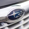 Subaru badge on the grille of a black car