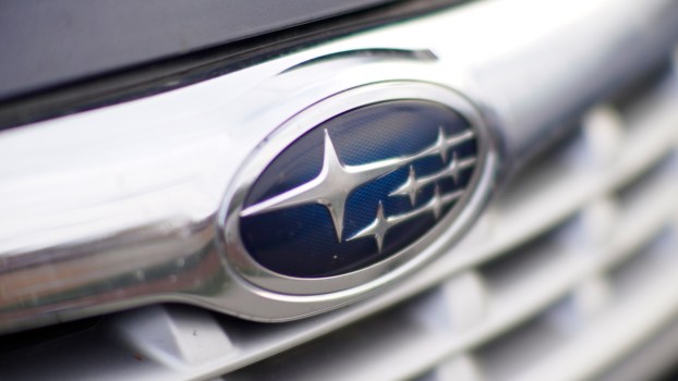 Subaru badge on the grille of a black car
