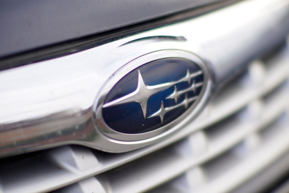 Subaru badge on the grille of a black car
