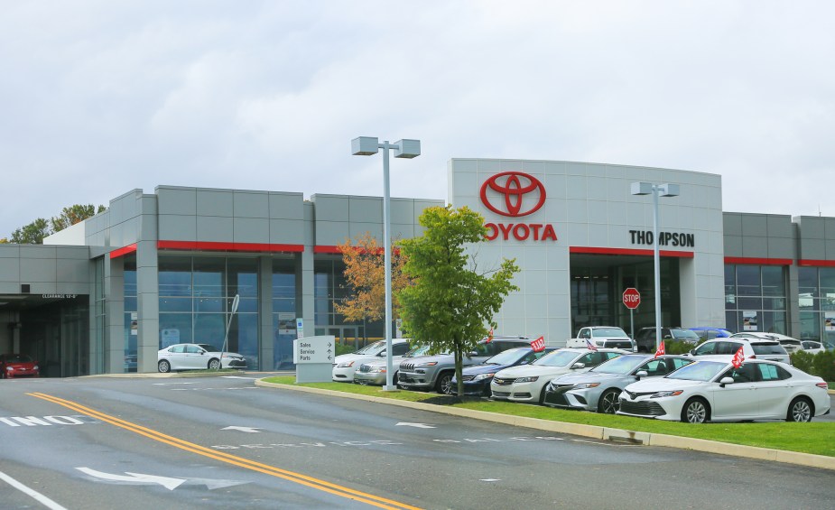 A Toyota dealership on a cloudy day
