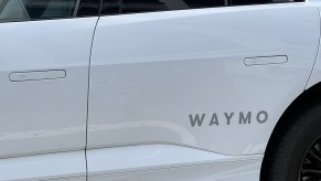 The Waymo logo on a Google self-driving taxi.