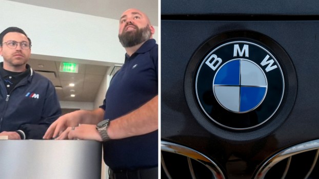 BMW service center workers(l) close up of BMW emblem from grille(r)