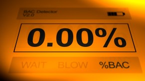 A breathalyzer screen reading 0.00% in very close view