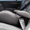 Child booster seat installed in car in close low profile view