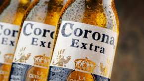 Corona beer bottles in close view of labels
