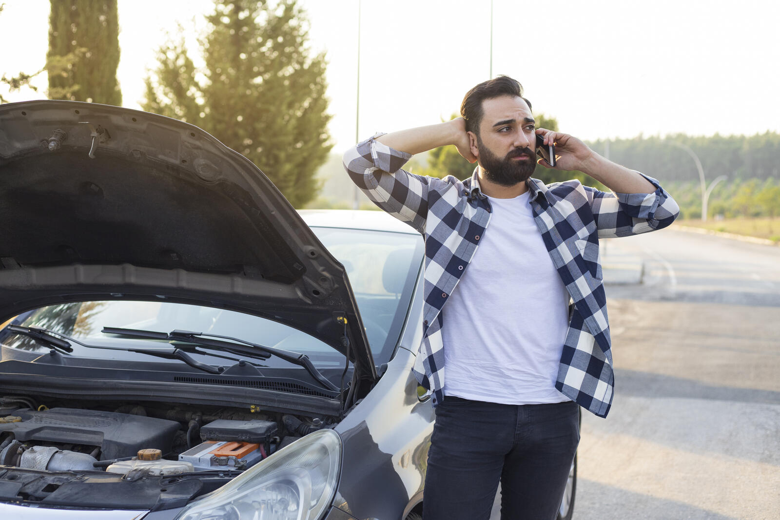 driver-on-phone-after-car-breakdown.jpg