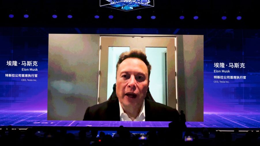 Tesla CEO Elon Musk speaks via video during the opening ceremony of 2023 World Artificial Intelligence Conference at Shanghai World Expo Exhibition and Convention Center on July 6, 2023 in Shanghai, China.