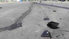 Debris left over from a hit-and-run car accident