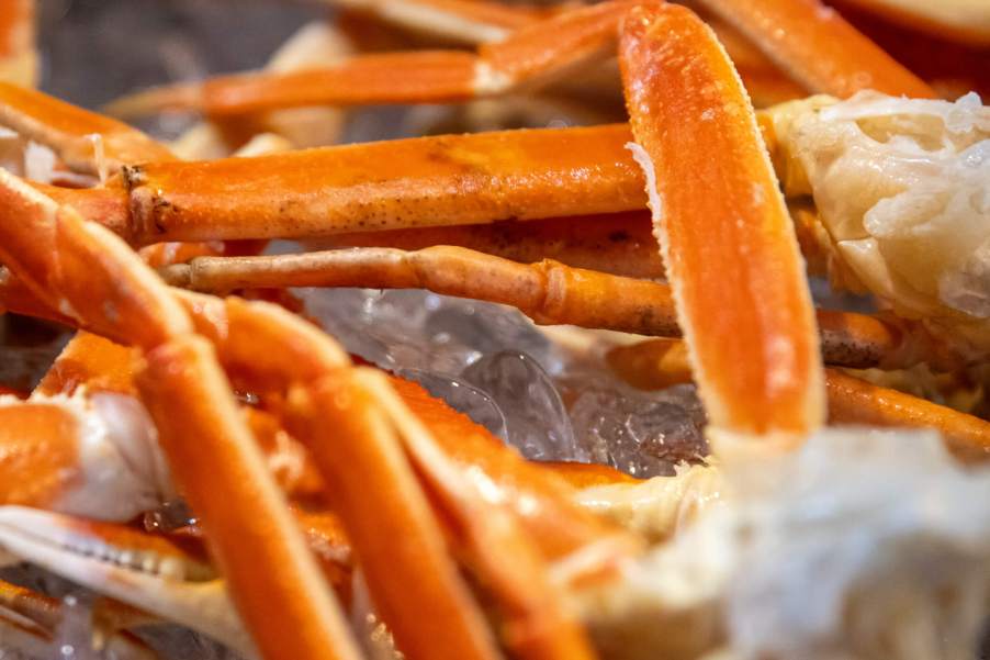 Dinner of crab legs on ice.