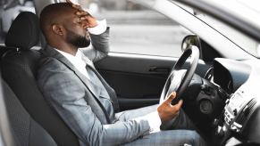 A frustrated male driver