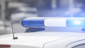 Police cruiser blue roof lights in close view