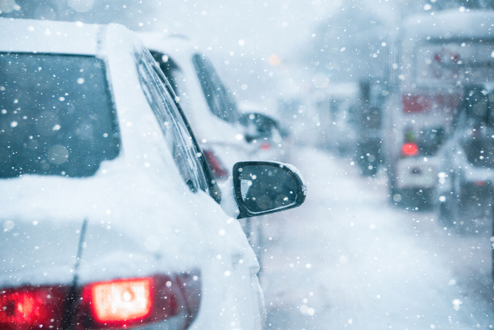 Taillight view of a traffic jam on a wintry highway
