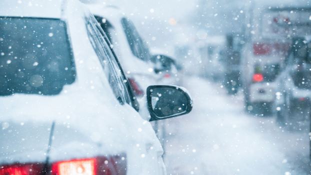 Taillight view of a traffic jam on a wintry highway
