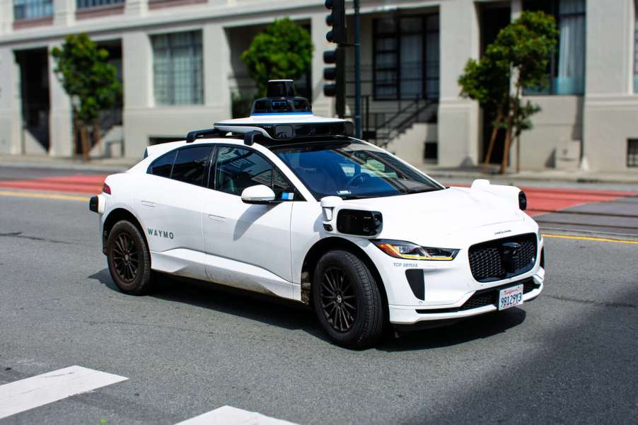 A Waymo driverless car in right front angle view