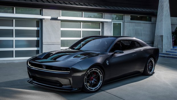 The 2025 Dodge Charger near a home
