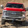 A 2025 Ford F-250 climbing over rocks