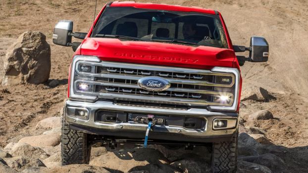 A 2025 Ford F-250 climbing over rocks