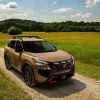 The 2025 Nissan Rogue on a dirt road