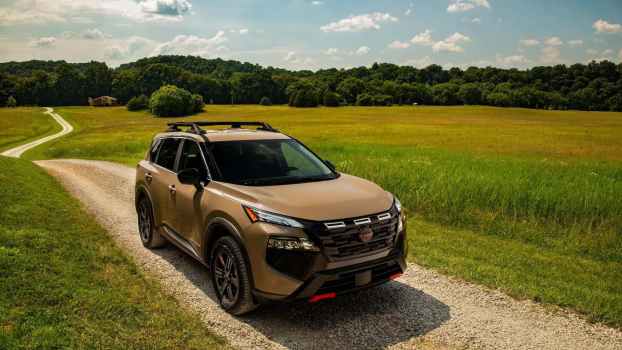 The 2025 Nissan Rogue on a dirt road
