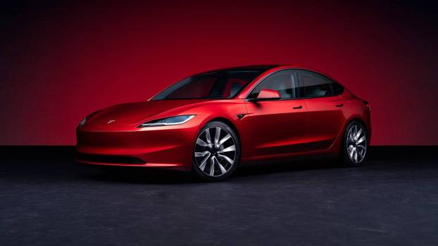 The 2025 Tesla Model 3 against a red background