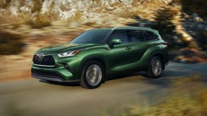 The 2025 Toyota Highlander on the road