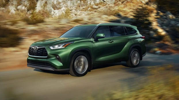 The 2025 Toyota Highlander on the road