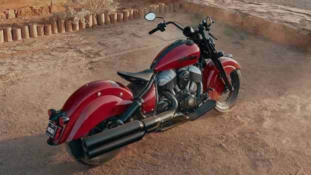 Overhead view of a bright red Indian Chief Vintage motorcycle parked in the desert.