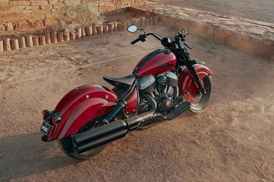 Overhead view of a bright red Indian Chief Vintage motorcycle parked in the desert.