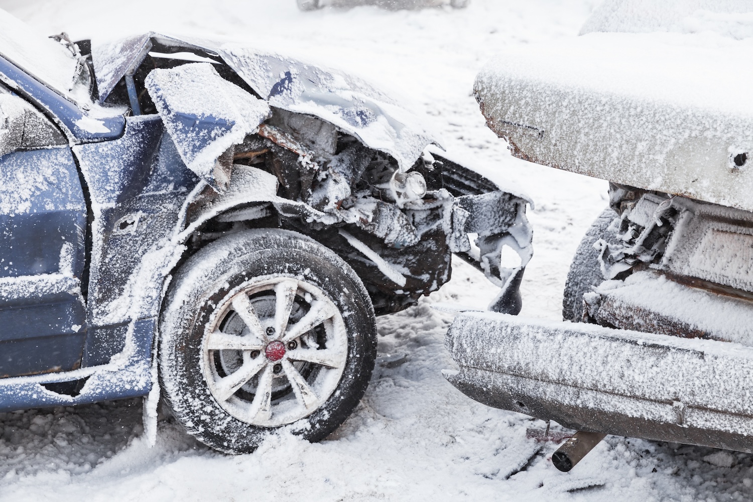 Wrecked cars in the snow
