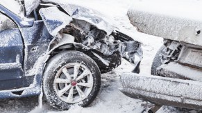 Wrecked cars in the snow
