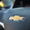 Bowtie logo on the steering wheel of used Chevy Bolt EV.