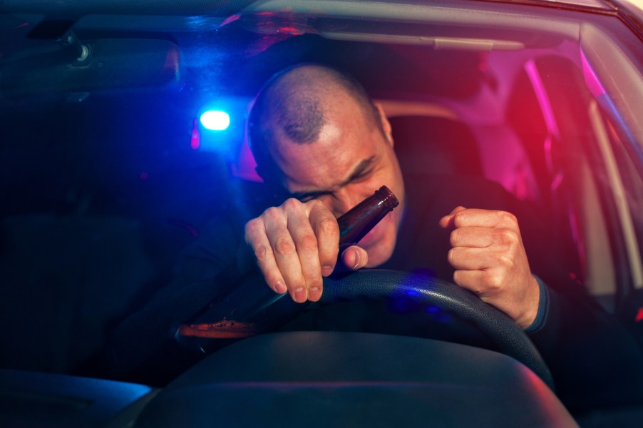 A drunk driver being stopped by police
