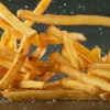 French-Fries-Falling-on-Table