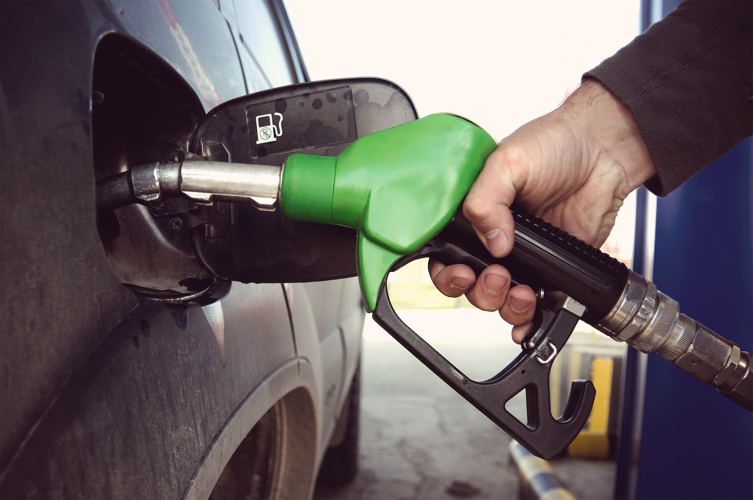 A person getting gas