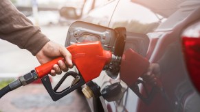 A person putting gas in their car