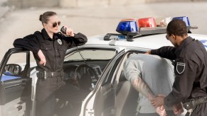 Police officers arresting a man