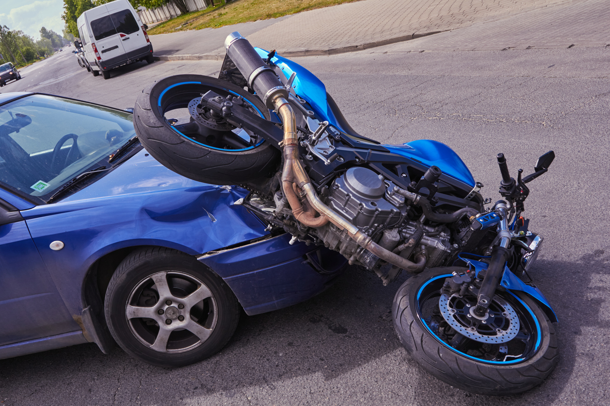A car hitting a motorcycle