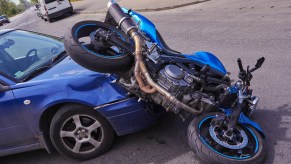 A car hitting a motorcycle