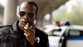 A police officer using a radio