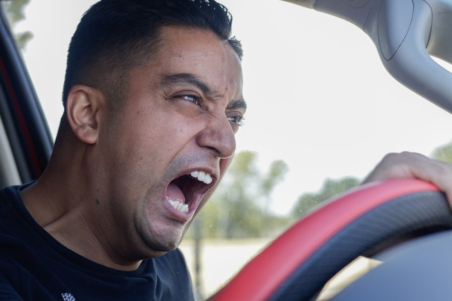 A man in a truck screaming