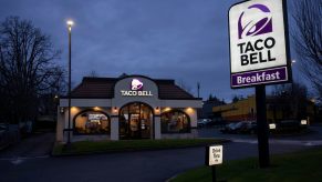 Late night Taco Bell with drive thru line open.