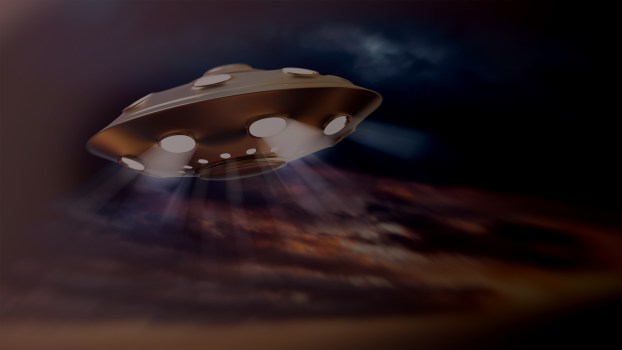 UFO-alien-flying-saucer-in-evening-night-sky