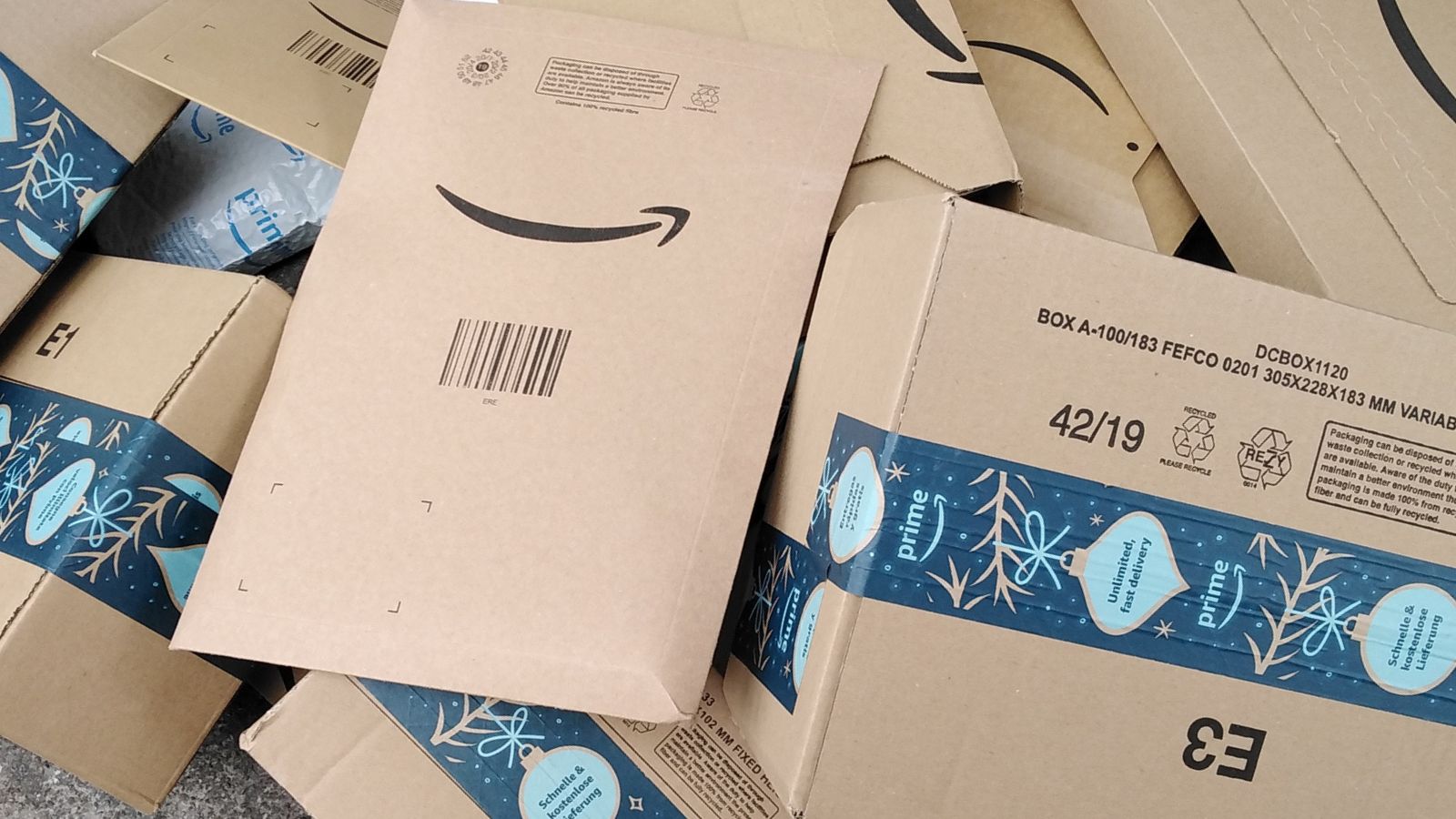 A pile of Amazon packages in close view