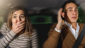 Depiction of scared couple in Uber backseat
